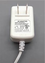 Adaptateur à prise un morceau.